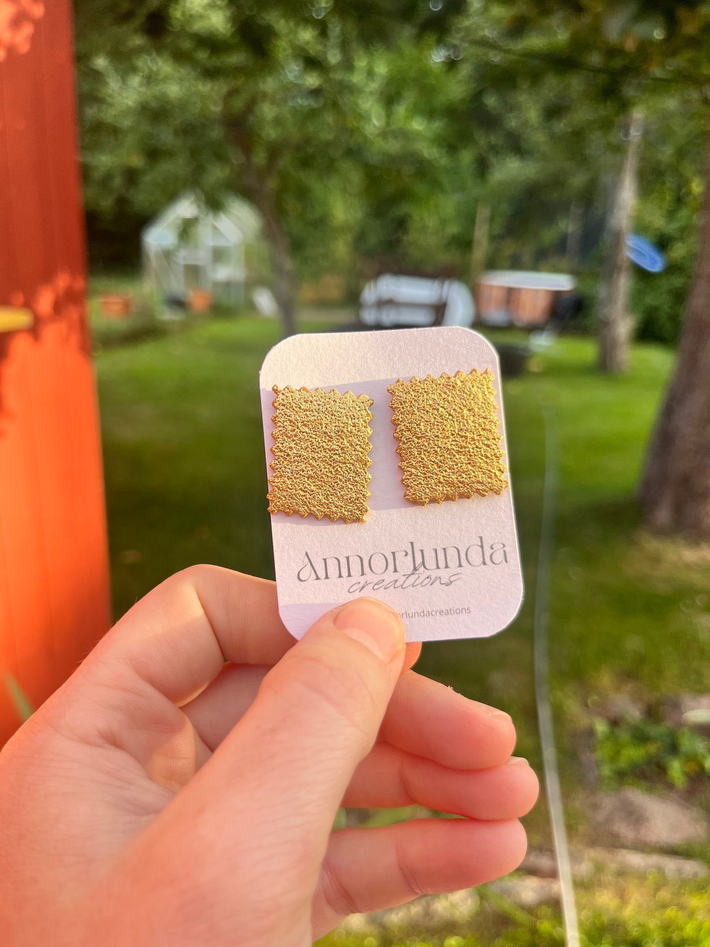 STAMP studs in gold