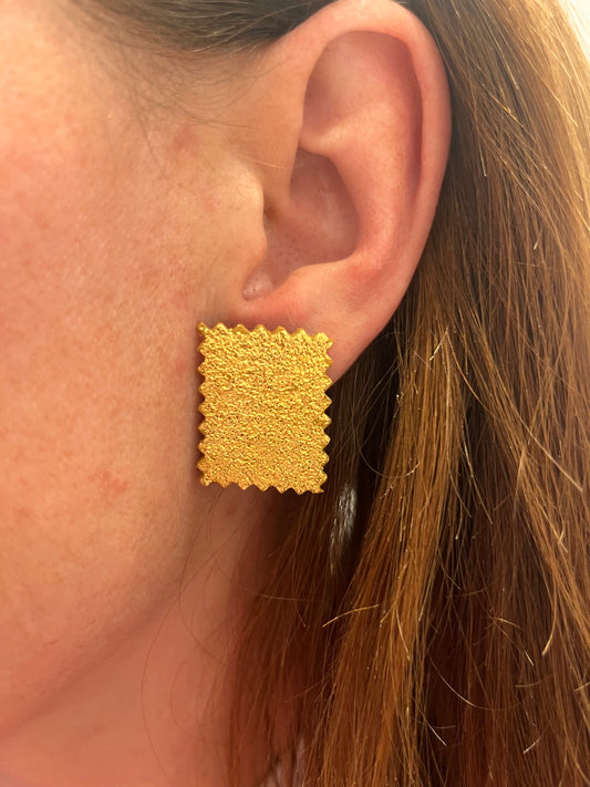 STAMP studs in gold